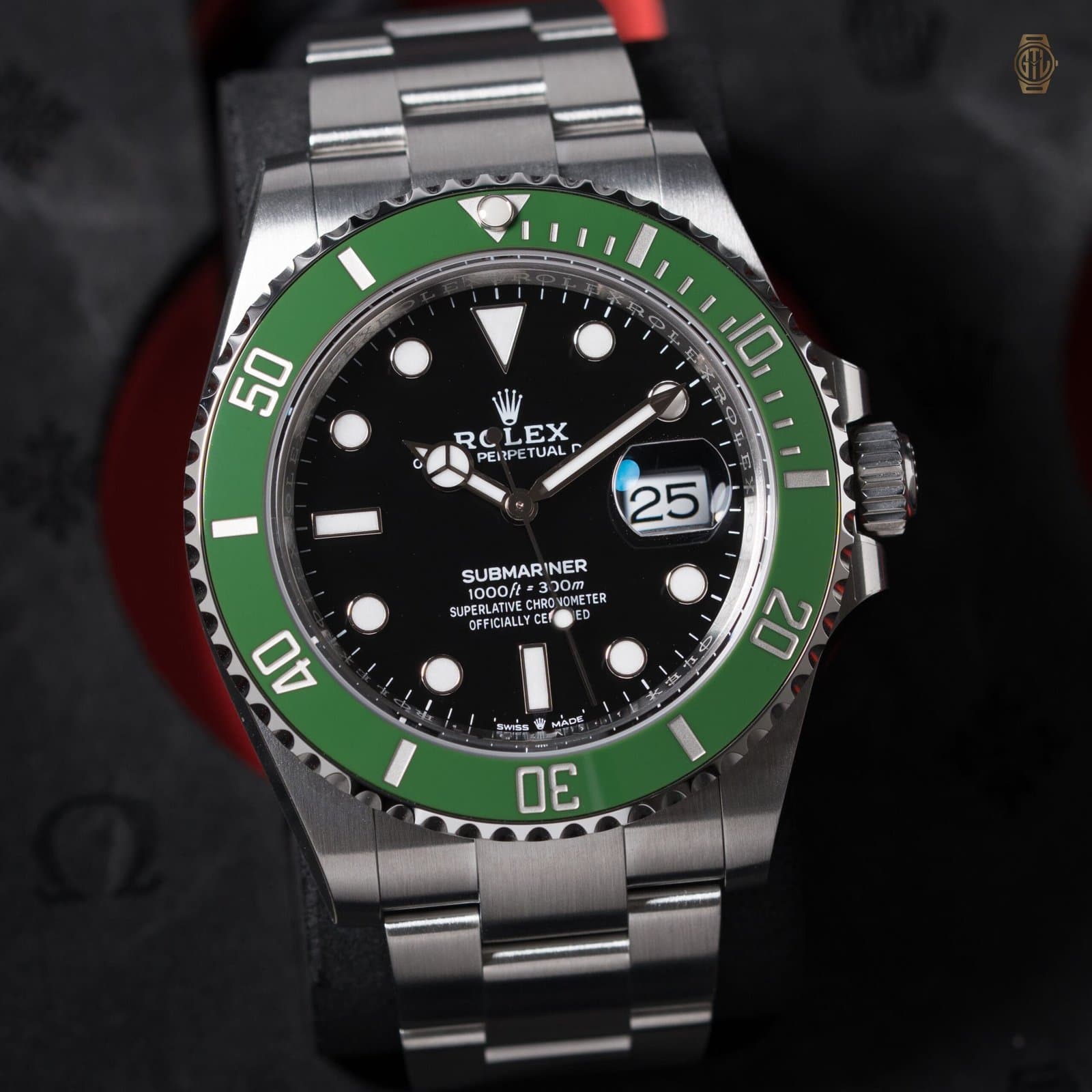 Rolex Submariner in Oystersteel with a green Cerachrom bezel and black dial