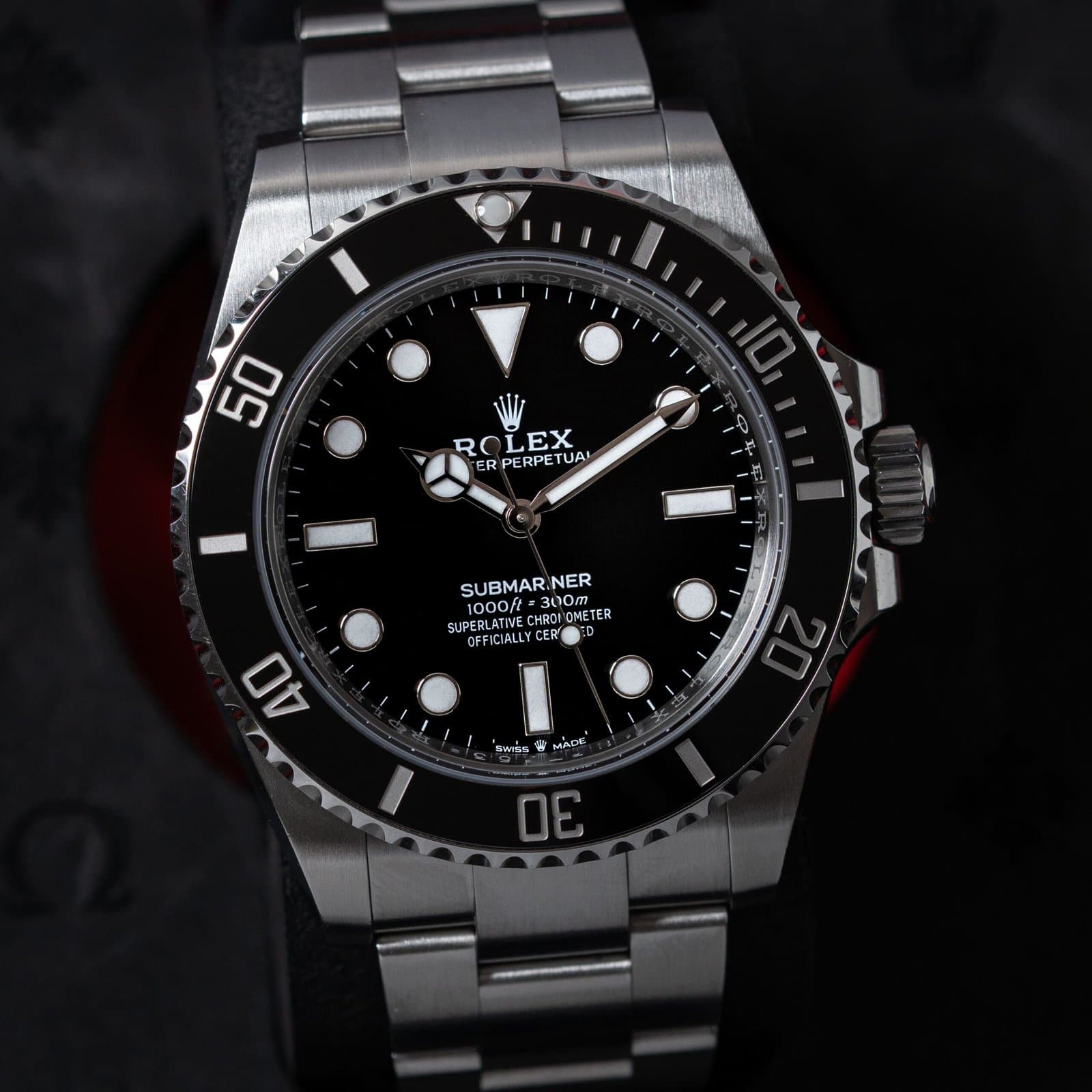 Rolex Submariner in Oystersteel with black dial and black Cerachrom bezel