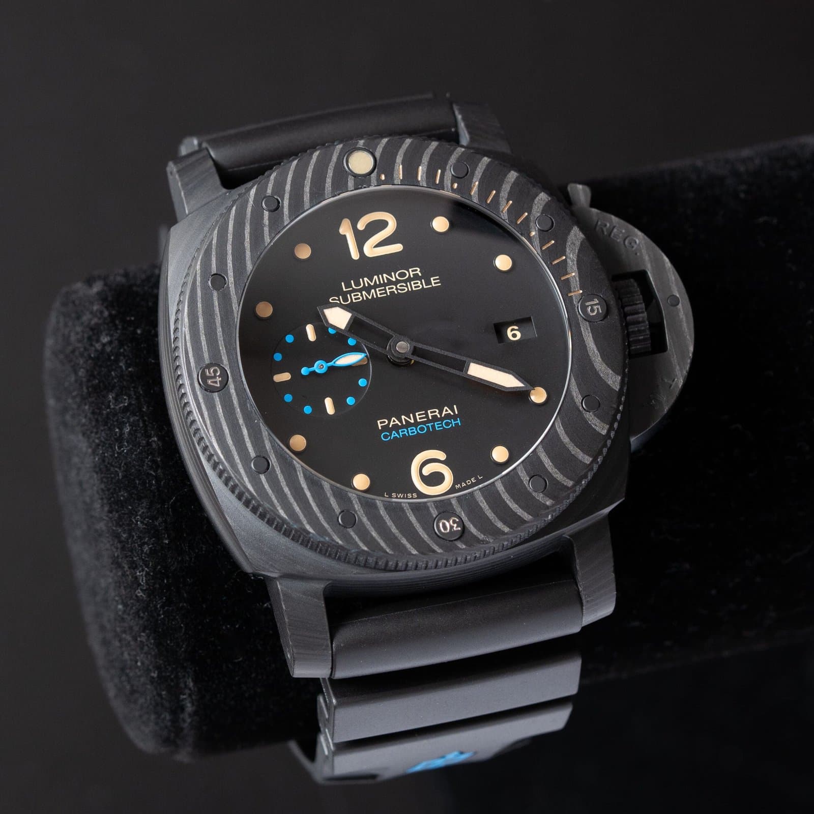 Panerai Luminor Submersible in black Carbotech with a rubber strap on a dark background