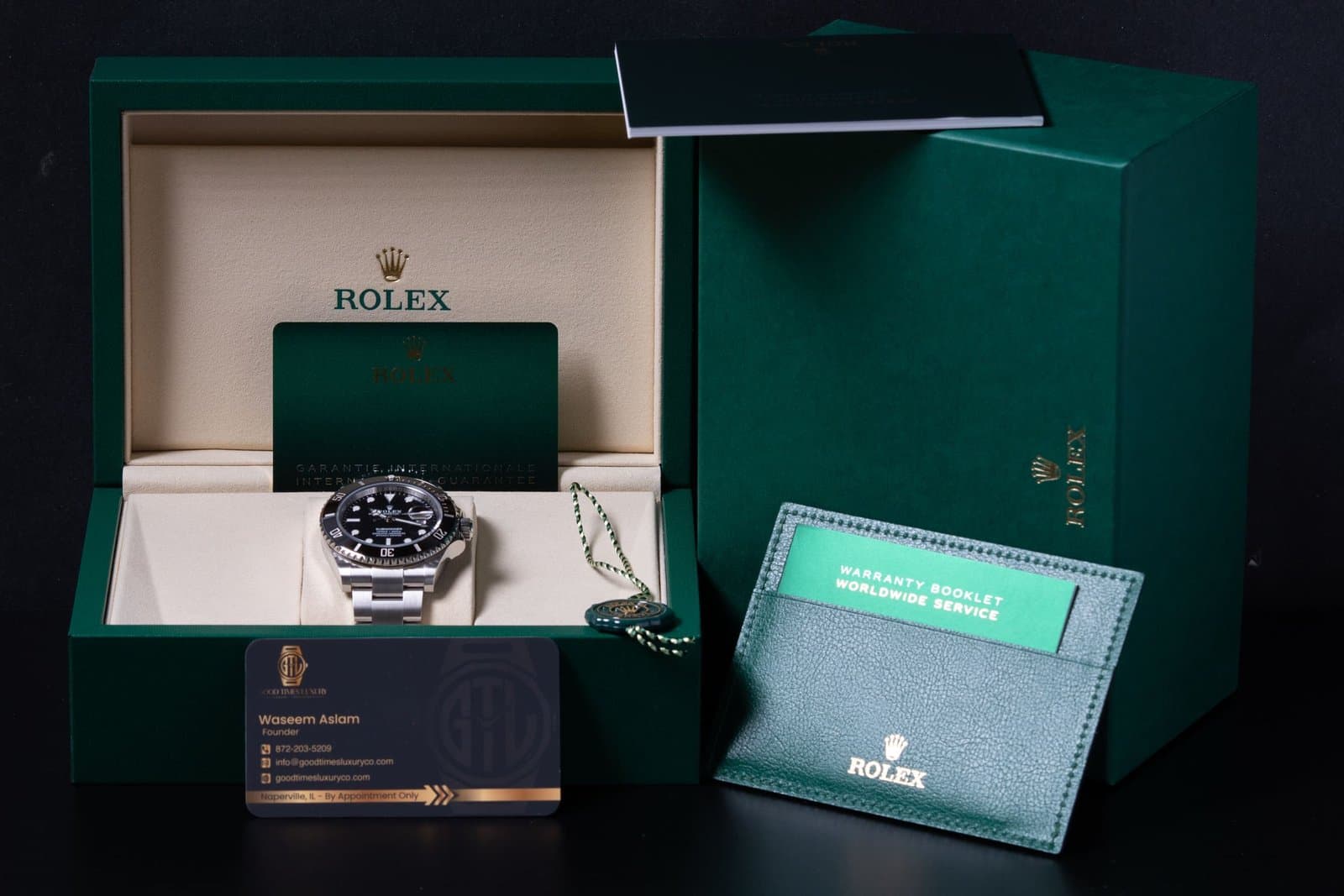 Steel Rolex Submariner Date 126610LN in its green box with the warranty card, booklet and a Good Times Luxury card reading Naperville, IL, By Appointment Only