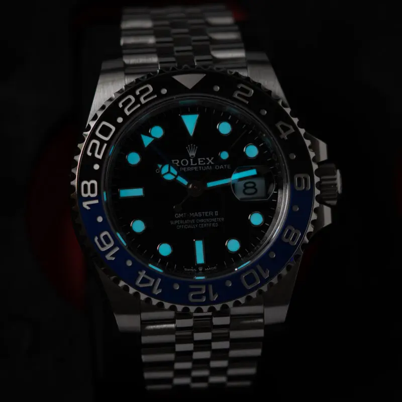 Rolex GMT-Master II “Batgirl” with blue lume glowing in the dark