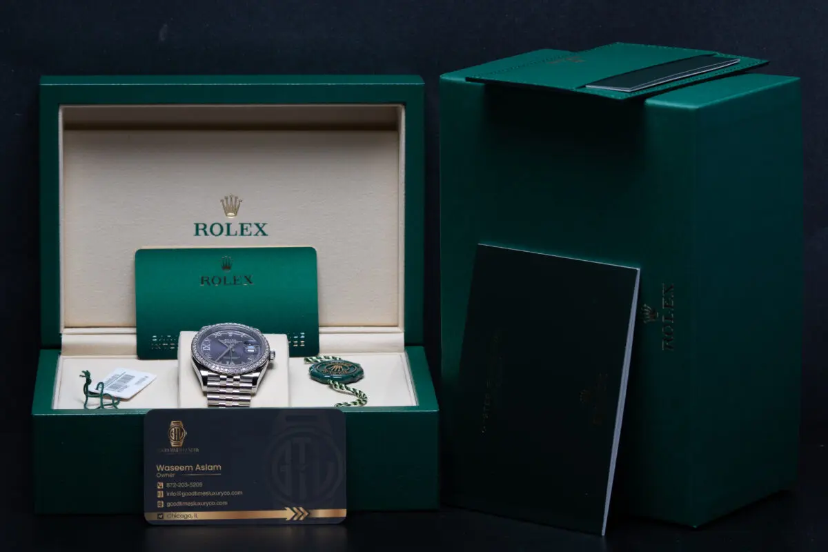 Rolex Datejust purple dial with diamond bezel displayed in original Rolex box with papers and accessories