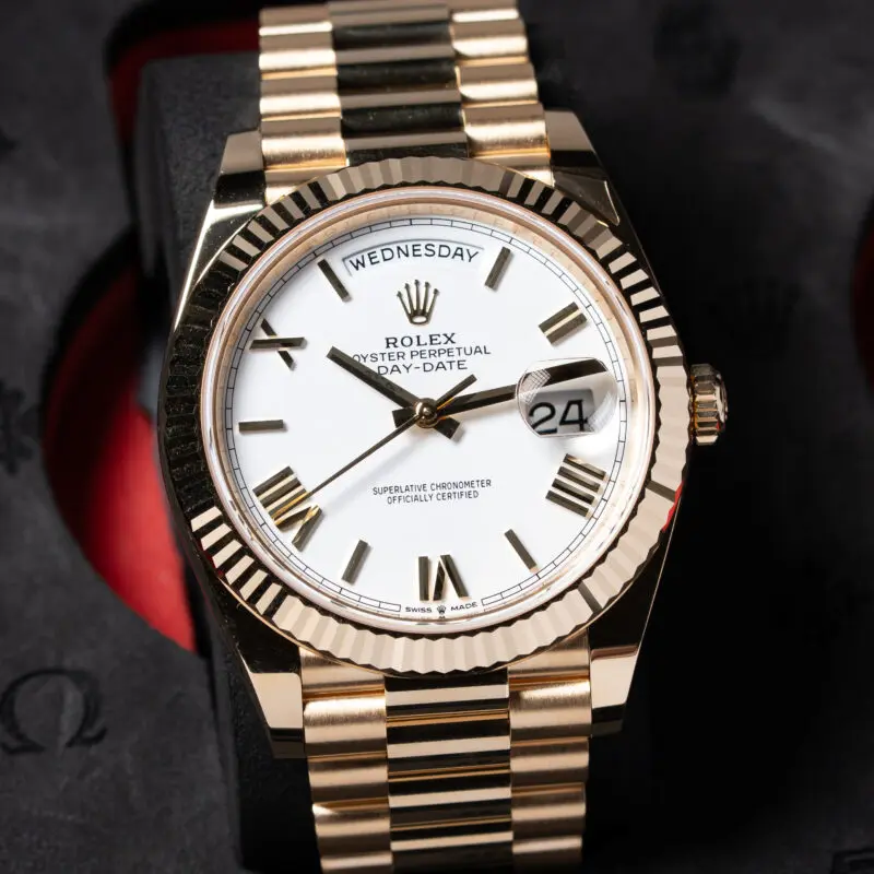 Home 2 2026 Rolex Day-Date 40mm White Roman Dial Yellow Gold