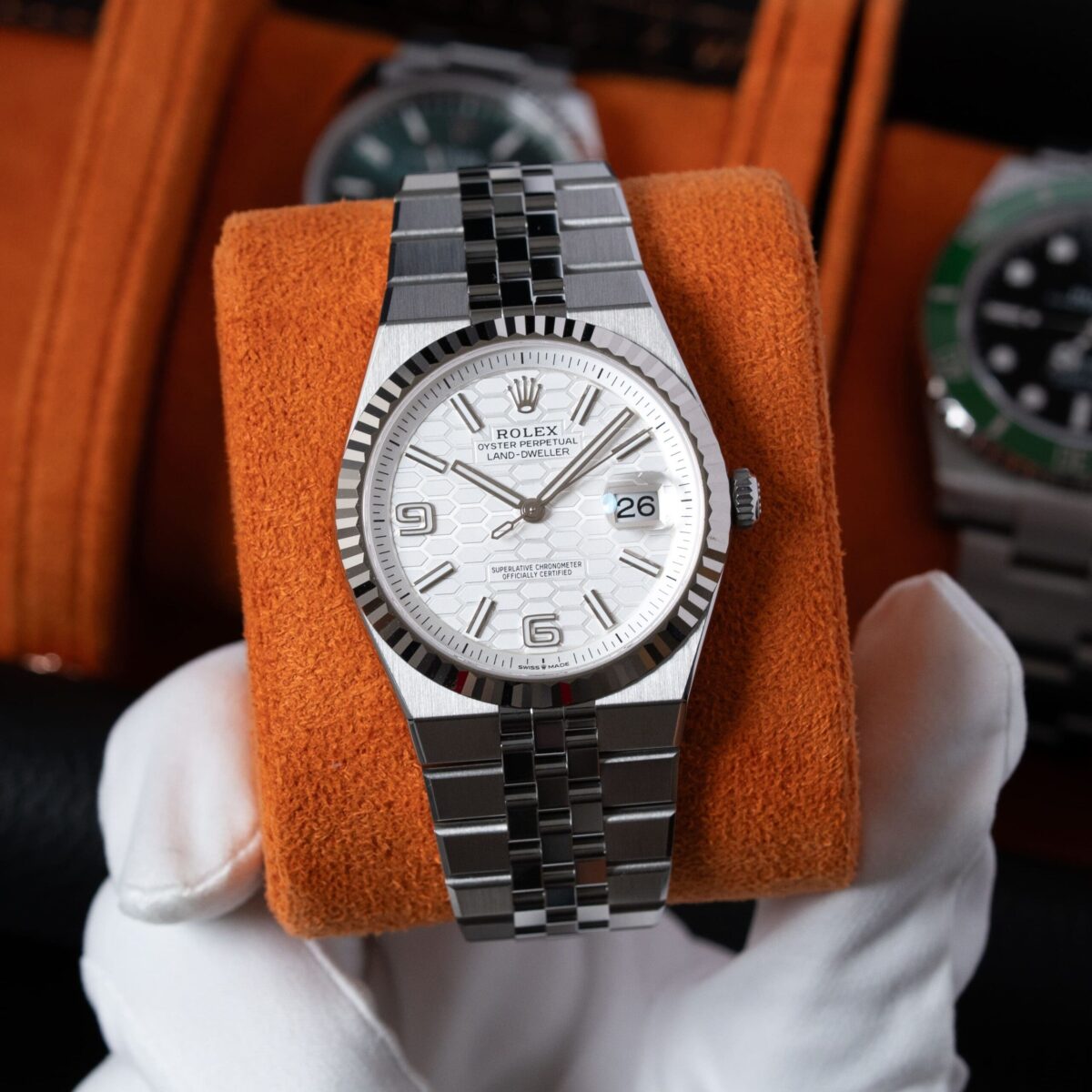 Luxury watch held in hand